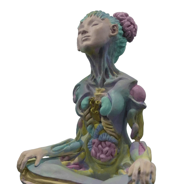 Pastel figurine in a meditative pose with exposed anatomy and a brain-shaped bun hairstyle.